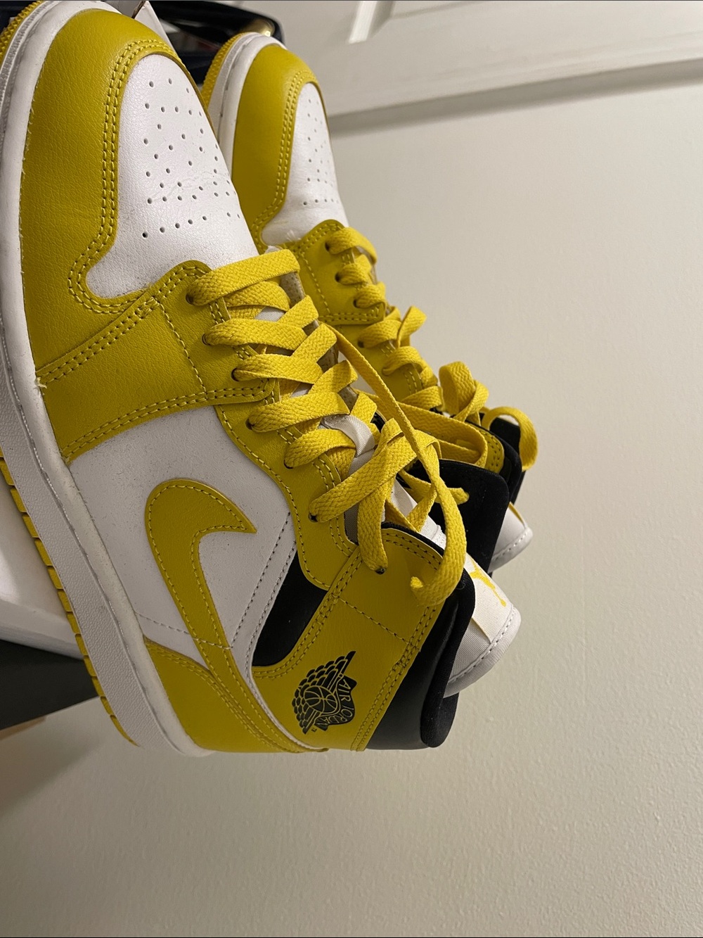 Jordan Yellow and White High-Top Sneakers
